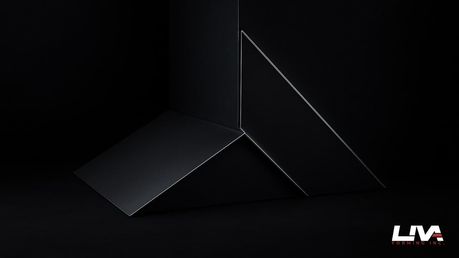 Matte graphite kick-out and head flashing profile at a roof-to-wall intersection under dramatic side light